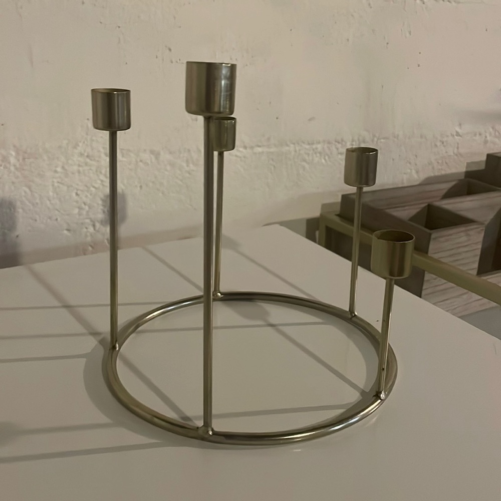 Circular gold candle holder